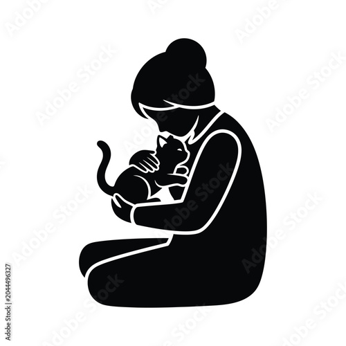 Фотография Woman Holding a Black Kitten.