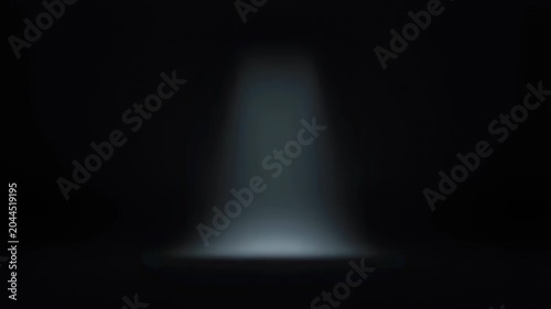 Soft spotlight illuminating a dark space, creating a dramatic atmosphere for performances or presentations. Ideal for theatrical settings and visual storytelling