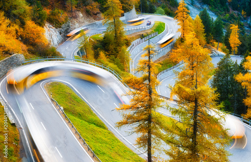 Bild auf Leinwand High-angle photography of the Maloja Pass mountain road in Switzerland