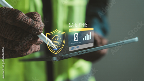 Foto Zero accident and safety first concept industrial worker using tablet and stylus