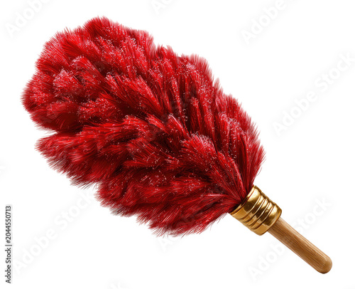 Red feather duster with a wooden handle on a solid black backdrop