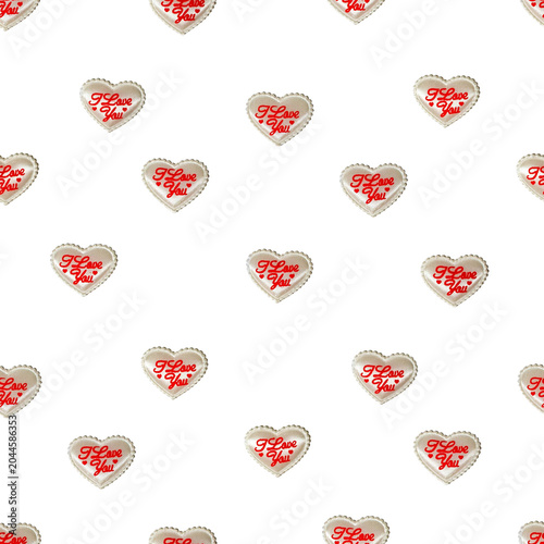 Seamless pattern of embroidered hearts saying i love you