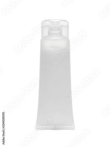 Close-up of a white cosmetic tube on a plain background