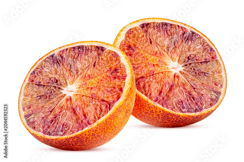 Two ripe red blood orange cut in half