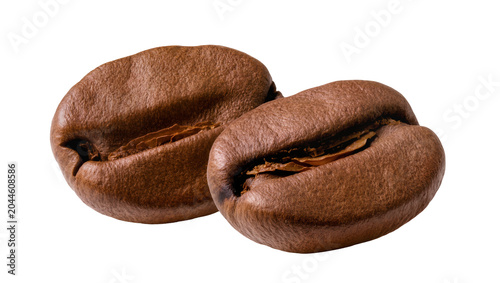 Photos Two roasted coffee beans with deep brown color and textured surface