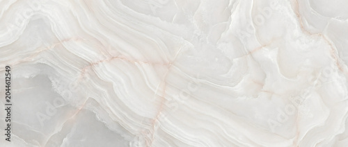 Foto Onyx background features a luxurious polished soft white quartz stone surface wi