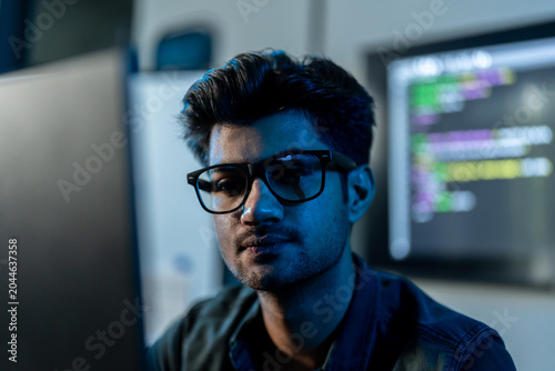 Close Up Portrait Of Male Software Developer With Glasses
