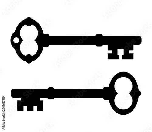 Two vintage skeleton keys silhouette isolated on white background