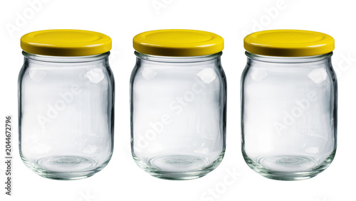 Fényképezés Three empty glass jars with yellow lids