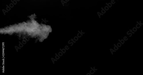Realistic cold breath vapor drifting through dark air in slow motion. Frozen exhalation smoke effect on black background, ideal for winter scenes, overlays, VFX compositing and cinematic effects.