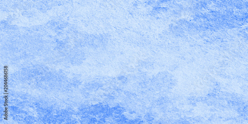 Photos An abstract blue watercolor and grunge paper background with a bright winter tex