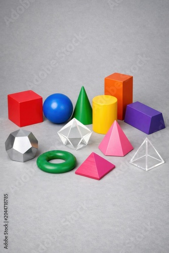 colorful geometric shapes on gray background