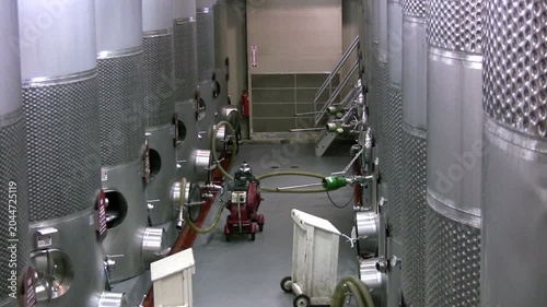 Stainless Steel Fermentation Tanks in Modern Winery Cellar