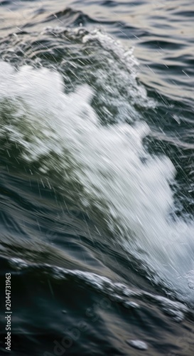 Dramatic Ocean Wave Crashing with White Foam and Turbulent Water.