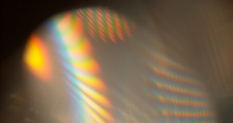 Abstract RGB prism lens flare with colorful light refraction and optical distortion. Creative cinematic background suitable for visual effects, overlays and modern digital design.