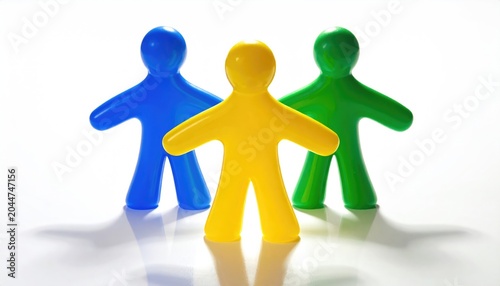 Three stylized figures, yellow center, blue and green flanking