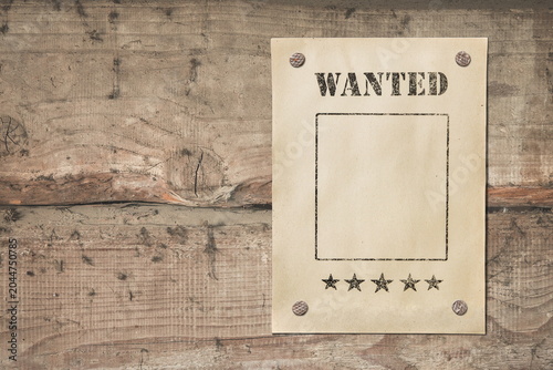 old paper wanted poster on grunge background