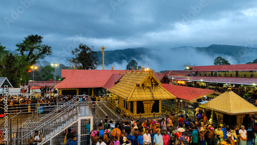 Photos Sacred Sabarimala Ayyappa Temple with Pilgrims and Mist-Covered Western Ghats, K