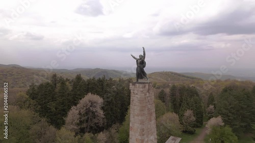 Cinematic drone shot of Freedom Monument on Iriski Venac, Fruska Gora. Aerial video of the iconic Yugoslav WWII spomenik memorial statue surrounded by lush green forests.Fruska Gora,Serbia 16.04.2026