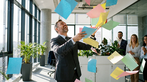Mature company owner throwing paper in office celebrating big business success web banner.