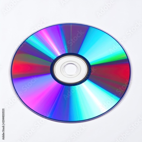 Iridescent, rainbow-hued disc reflects light with dazzling, radial patterns