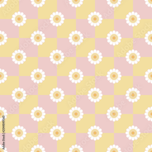 Seamless checkered pattern with camomiles. Flower background with pastel pink and yellow. Floral wallpaper design.	
