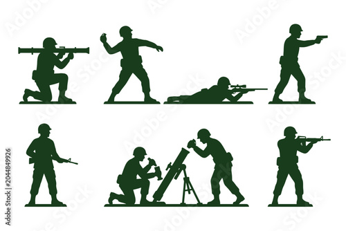 Canvas Print Green toy soldier silhouettes in various combat poses