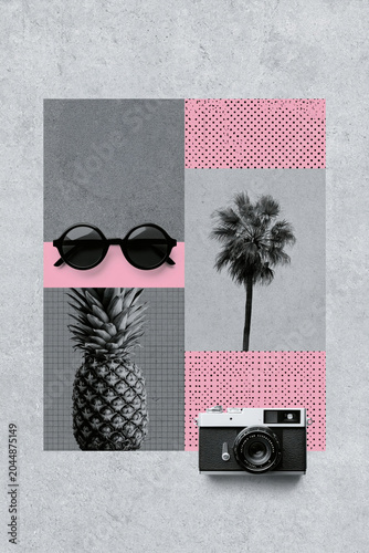 Pineapple, palm tree, and camera with sunglasses on a gray background in a stylish layout