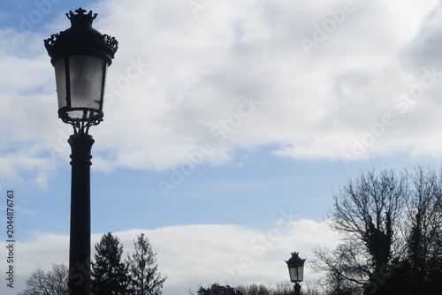 Tableau sur toile Farolas entre nubes