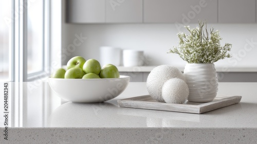 Minimalist modern kitchen decor with white pots green apples and fresh flower arrangement