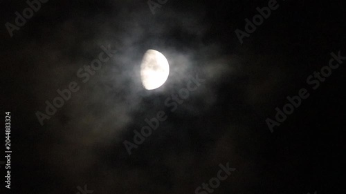 half moon and clouds at night