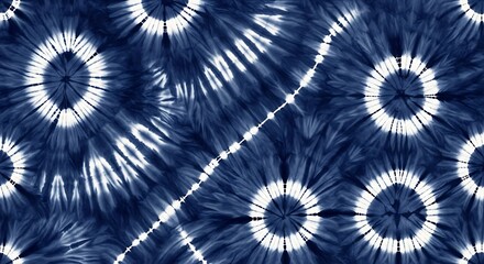 Seamless tie dye pattern with blue and white circular sunburst shapes and decorative lines for textile design