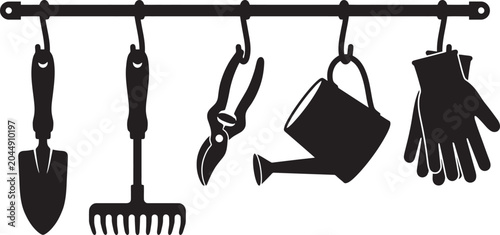 Photos A collection of essential garden tools including a trowel rake pruners watering
