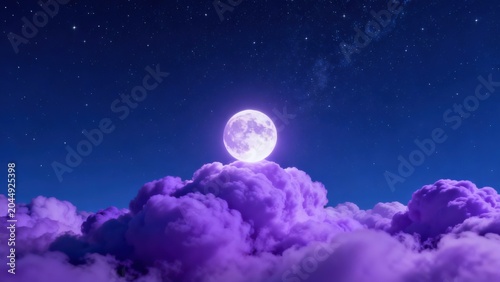 Moon above purple clouds in night sky