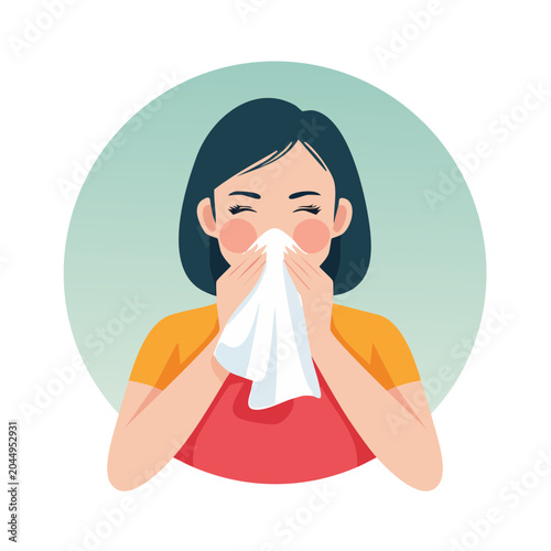 Woman blowing her nose with a tissue