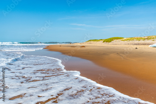 Beautiful tropical beach with blue sky and white clouds
