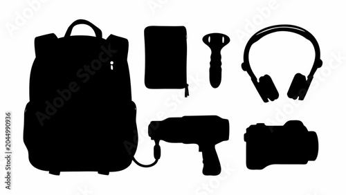 Collection of black silhouettes of travel and technology items