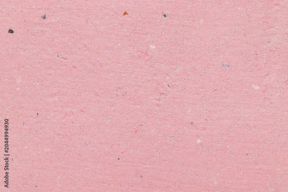 Fototapeta premium Pastel pink handmade paper texture, tactile background with abstract speckled pattern close-up