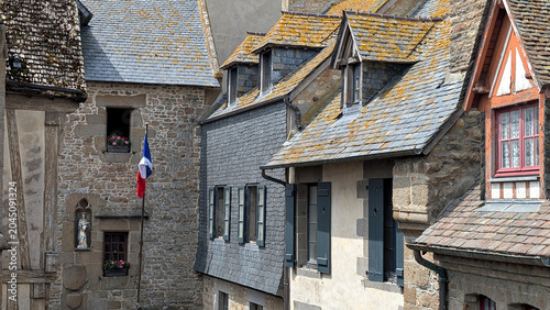 Bild auf Leinwand Traditional Half-Timbered Houses in Mont Saint-Michel, France.