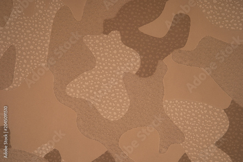Embossed leather texture with irregular camouflage shapes and linear detailing for background use