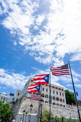 Puerto Rican and American flag flying in Old San Juan, Puerto Rico 