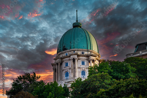 Fotografie The dome of Buda Castle on a hilltop in Budapest, the capital of Hungary at suns