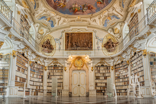 Baroque Library Interior with Bookshelves and Fresco Ceiling