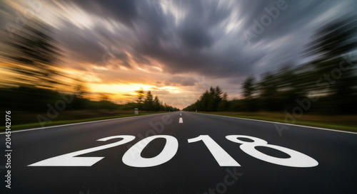 Road to 2018 Conceptual Image Asphalt Leading Toward Horizon Success Future Direction Goals Perspective Ambition Motivation Transportation