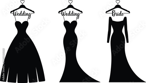 Tableau sur toile Black silhouettes of three wedding dresses on hangers one with a long train and