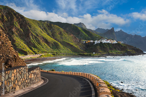 Quadro su tela Winding Coastal Road Along Dramatic Cliffs and Turquoise Atlantic Ocean Toward t