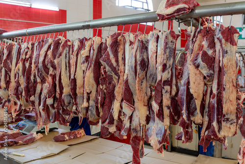 Raw Horse Meat Hanging at Traditional Central Asian Bazaar