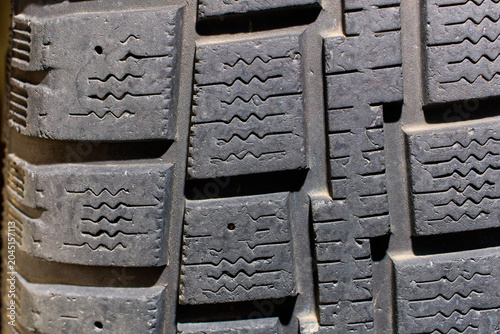 Εκτύπωση καμβά Close-up of rugged tread pattern on a well-worn vehicle tire
