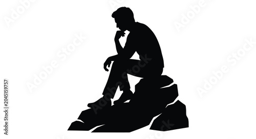 Photos Silhouette of a thoughtful man seated on rocks black against white background