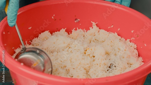 Indian couscous food preparation in a red bowl during the Vaisakhi festival